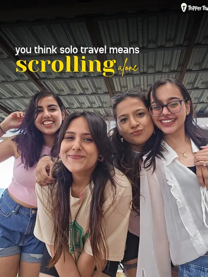Think solo travel means scrolling alone? Not on my trips. Here, you'll find real connections and a squad that makes you feel right at home, like these four friends smiling together.