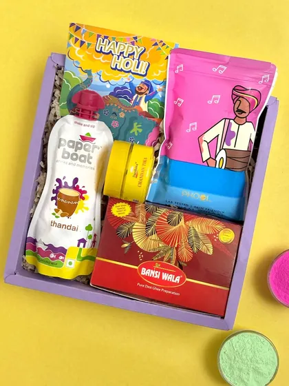 Celebrate the festival of colors with a hamper that’s just as vibrant. This Holi gift box is packed with fun and flavor, including a refreshing Paper Boat thandai, natural gulal for safe play, a jar of Chandan tika, and a box of traditional sweets. It’s a complete package to kickstart the Holi celebrations for your family, friends, or employees.