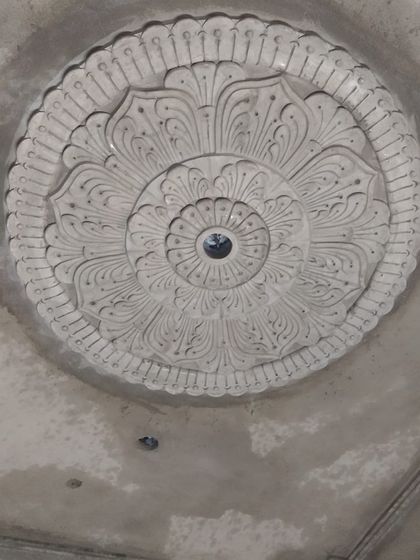 Another angle of the ceiling medallion, showing the crisp details of the petals.