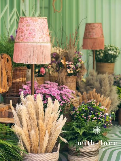 A detail of the decor at 'The Conservatory', with custom-fringed lampshades adding a touch of bespoke elegance.