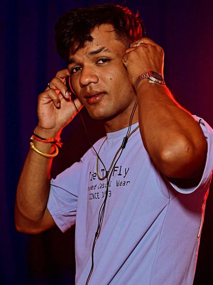 Lost in the music, found in the moment. A portrait of me with my headphones, ready to create the next vibe.