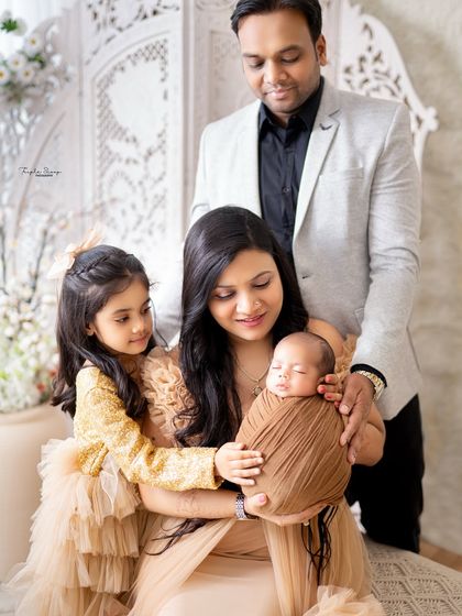 A beautiful moment with the whole family admiring their newborn baby. These are the memories that you will look back on for a lifetime.