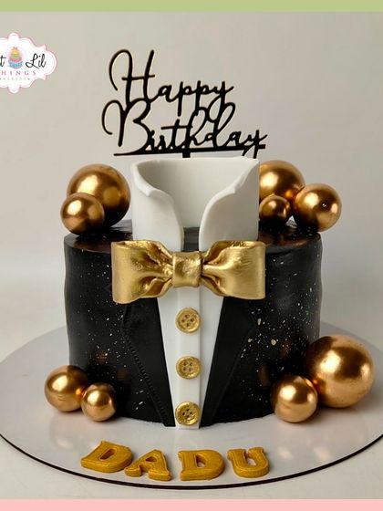 A dapper tuxedo cake for "Dadu's" birthday. This black and gold design is the epitome of class and style for a milestone celebration.