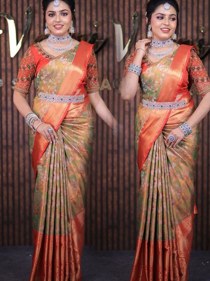 Model Saju in a floral printed silk saree. The drape is soft and flowing, showing versatility in styling different types of silk sarees for various looks.