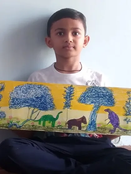 Kiaan, a 2nd standard student, created this panoramic 'Jungle story' using a mix of sketch pens and oil pastels. This long-format drawing encourages narrative thinking and detailed composition.