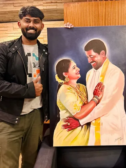 A proud moment with a completed acrylic couple portrait, showcasing the vibrant colors and happy emotions of the subjects.