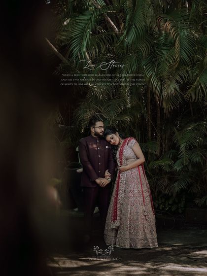 A romantic portrait of the couple in a quiet embrace, surrounded by the beauty of nature. A perfect "Love Story" moment.