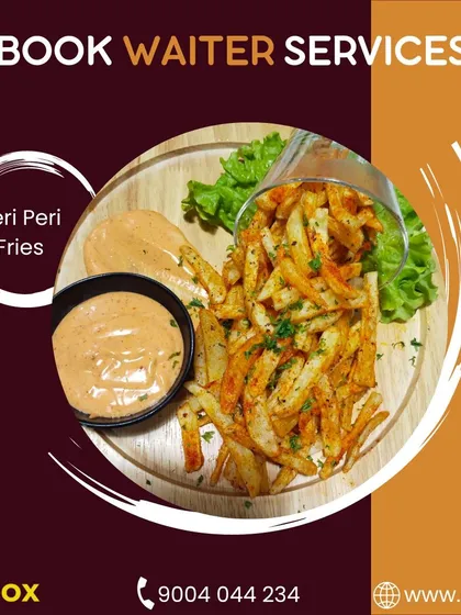 Crispy Peri Peri Fries served with a creamy dip. This is just one of the many crowd-pleasing snacks and appetizers our chefs can whip up for your event.