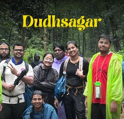 A group photo from our Dudhsagar trek. The rain ponchos are essential, but the smiles are even more so.
