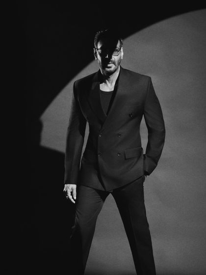 A dramatic, high-contrast black and white shot that plays with shadows to create a memorable image.