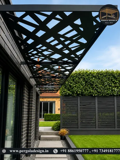 A modern carport with a unique, abstract laser-cut roof design. This structure proves that functional spaces like carports can also be architectural highlights of a home's exterior.