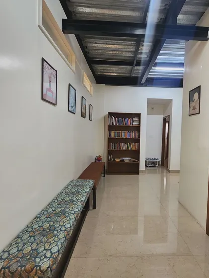 The corridor of our shala, with a small library and seating area. We believe the environment we practice in is just as important as the practice itself.