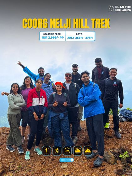 A group poses on the rocky terrain of the Coorg Nelji Hill trek.
