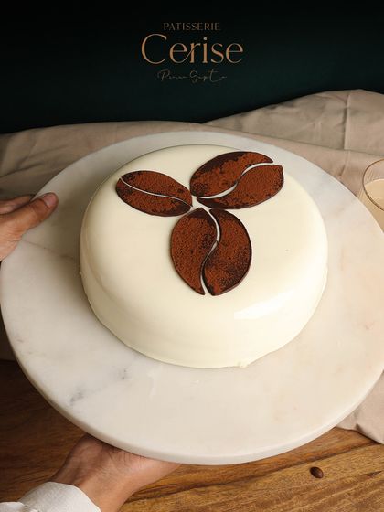 Good days are coming, and they taste a lot like my Tiramisu. A beautiful shot of the full cake, ready to be sliced.