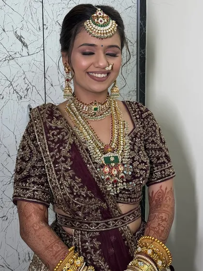 The most beautiful part of any bridal look is a happy, confident smile. This close-up shows a flawless, dewy makeup application that enhances the bride's natural beauty without overpowering it. Seeing my brides this joyful is the best part of my work.