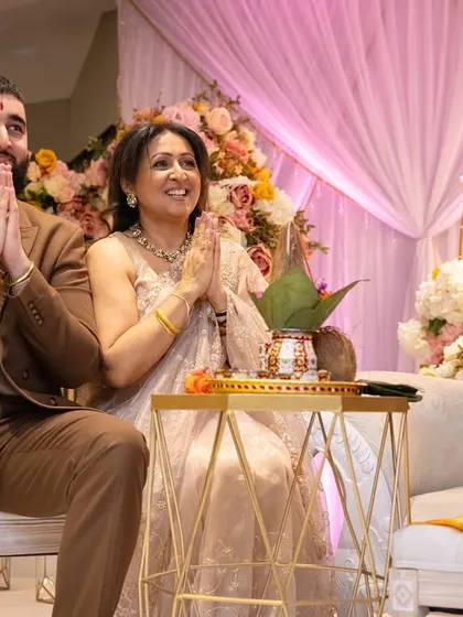 The groom and his mother during a puja as part of the ceremony. We cater for many religious and traditional functions, offering specialized menus like Jain or Satvik food.
