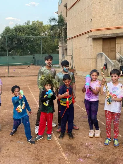 The entire academy celebrating the festival of colors. A fun-filled Holi on the courts with our players and coaches.