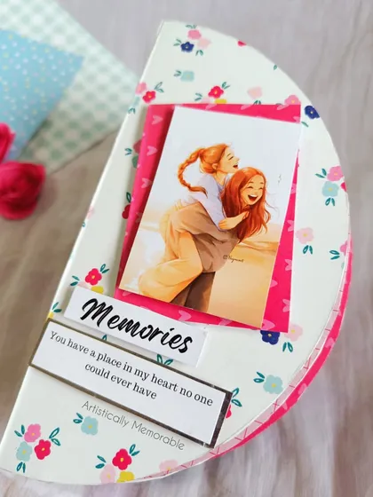 A beautifully styled shot of the semicircle 'Memories' album.