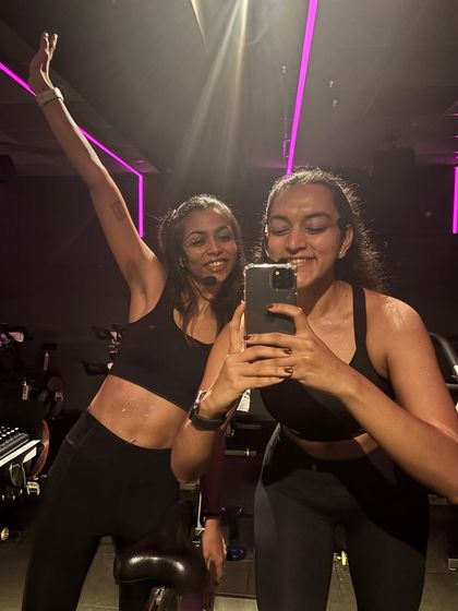 A post-ride selfie with your instructor is a must. It’s a celebration of the hard work you both just put in. The energy between our instructors and riders is what makes our classes so special.