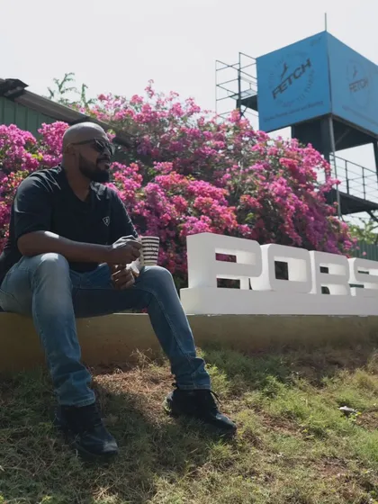 Taking a moment to relax at the Fetch facility during the Porsche event. It was a proud day for my team and me.