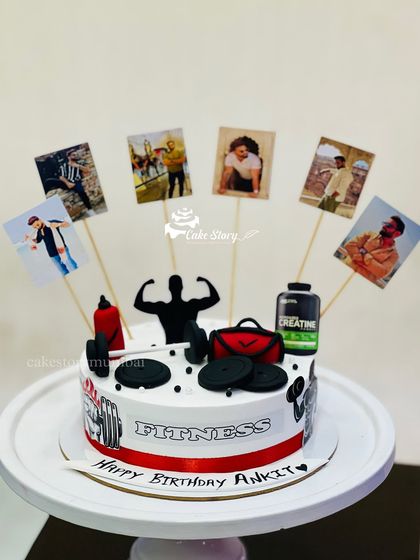 Another great option for a gym lover. This cake features a fitness theme with edible creatine, a gym bag, weights, and even personal photos of the birthday person.