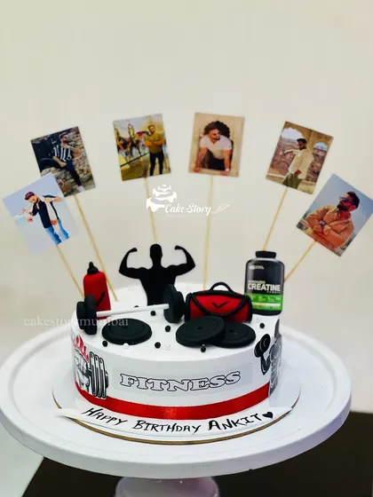 Another great option for a fitness lover. This gym-themed cake includes fondant weights, a gym bag, creatine tub, and is personalized with photos of the birthday person.