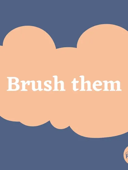 Brushing your dog is a great indoor activity for a rainy day and helps with grooming socialization.