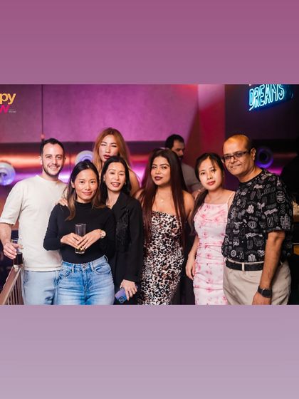 A group photo capturing a fun night out at Happy Brew.
