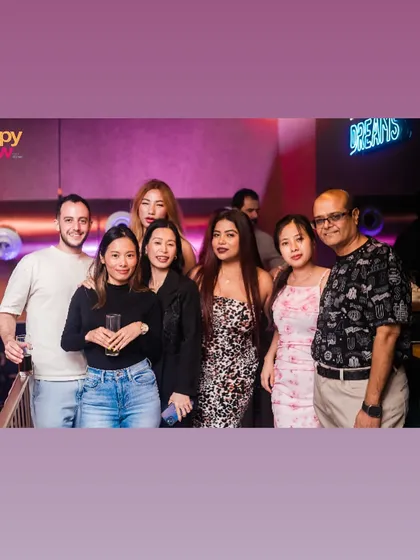 A group photo capturing a fun night out at Happy Brew.