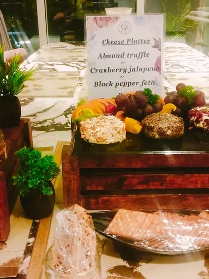 A cheesy affair. Our cheese platters feature a variety of our house-made cheese logs, including almond truffle, cranberry jalapeno, and black pepper feta.