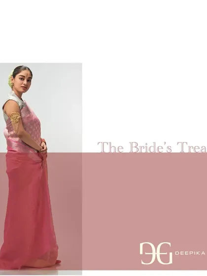 A full-length view of the 'Ashes of Roses' tissue saree, emphasizing its regal yet modern appeal. This piece is designed to be a treasured part of a bridal trousseau.