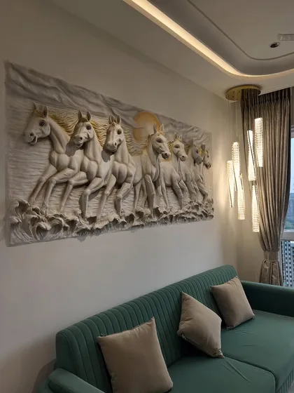 Here you can see the uncolored 7 Horses fibre mural in a contemporary living room setting, adding texture and sophistication above the sofa.