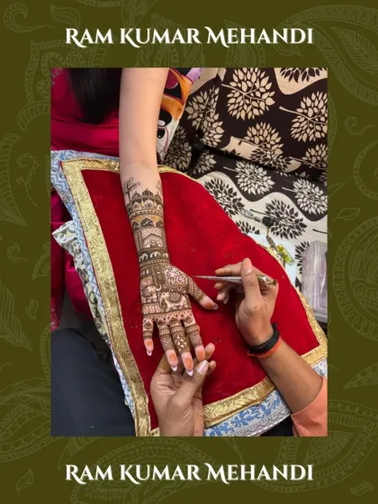 A picture of me applying a detailed bridal design, showcasing the intricate work and the focus it requires.