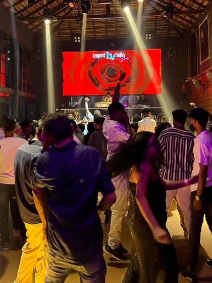 A wide view of the dance floor at Leopard Valley, Goa. The mix of an industrial-style venue with a high-energy party crowd is unmatched.