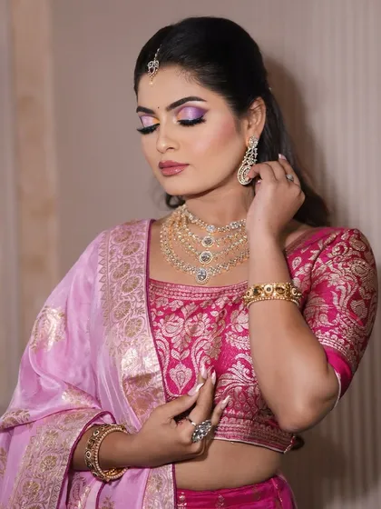 A close-up of the soft glam look, highlighting the flawless skin and the intricate eye makeup.