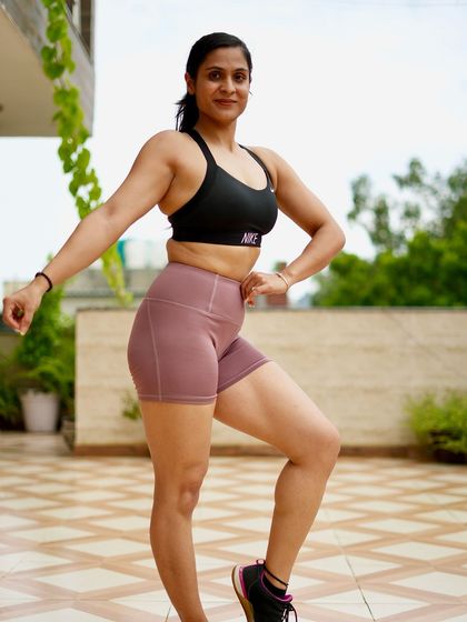 A side pose showing my current physique. A reminder to keep grinding and focus on progress, not perfection.