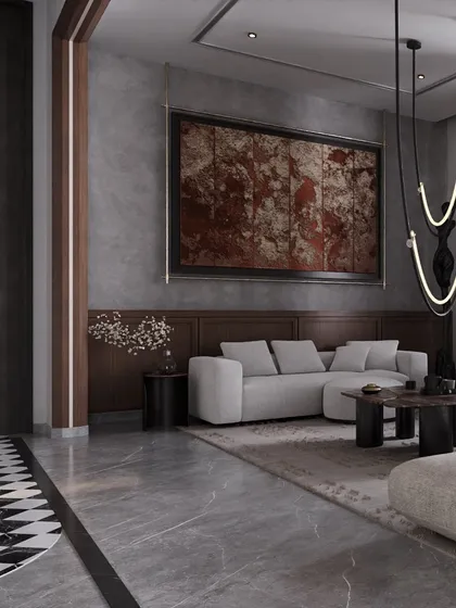 In this open-plan residence, we used a large piece of abstract art and wood paneling to define the formal living area. The design balances a cool grey color palette with the warmth of the artwork and wood, creating a sophisticated yet inviting zone.