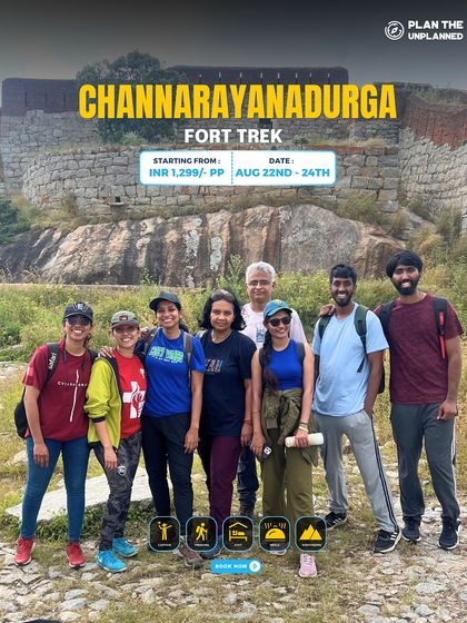 A group poses in front of the historic Channarayanadurga Fort. This trek combines a bit of history with a rewarding climb and beautiful views.