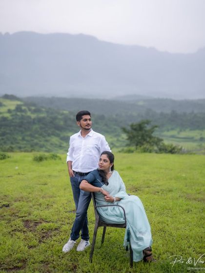 A variation of the pose, showing a more connected and classic couple portrait in the same beautiful mountain setting.