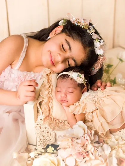 The beginning of a lifelong friendship. There is nothing sweeter than watching an older sibling meet their new baby sister. I gently guide these interactions to capture tender moments of love and protection.