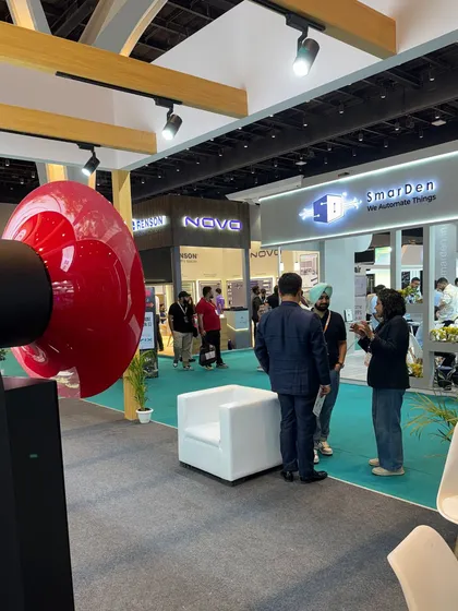A shot of our booth at the Smart Home Expo, with Jenny in conversation with visitors. These events are all about connecting with people and sharing our knowledge of audio technology.