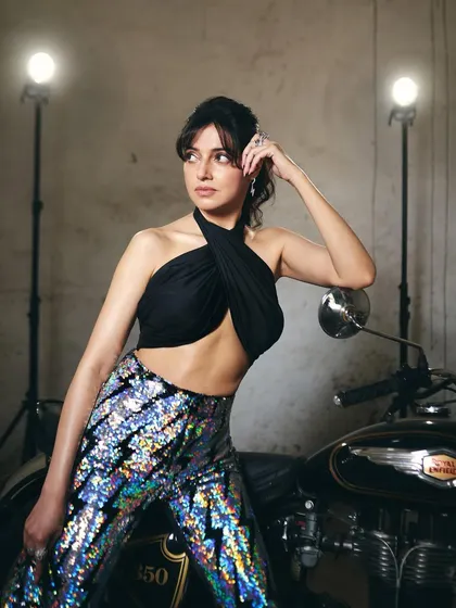 This series of shots captures the full biker-chic look I created for Divya Khosla Kumar's 'Yaariyan 2' promotions. The sequined jacket and pants by Any Old Iron paired with a simple black top created a cool, modern promotional style.