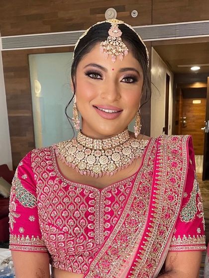 The bride looks radiant and ready for her wedding ceremony.