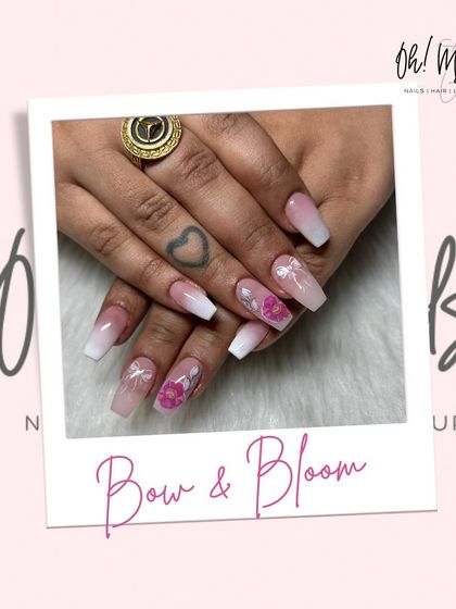 Bows and blooms for a sweet and pretty vibe. This design features a soft pink and white ombre base, adorned with delicate 3D bows and floral details.