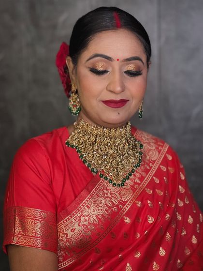 A close-up of the same reception bride with her eyes closed, showing the beautiful shimmer on her eyelids.
