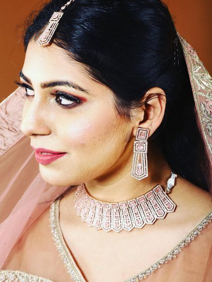 Here's a full bridal or festive look featuring one of my delicate pink choker sets with a matching maang tikka. This is how you can celebrate Diwali or attend a wedding in style.