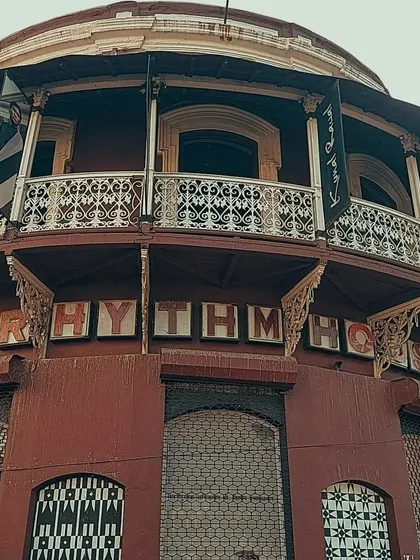 The iconic facade of Rhythm House in the Kala Ghoda district. While not graffiti, its classic typography and architecture make it a piece of public art and a landmark of the art precinct.