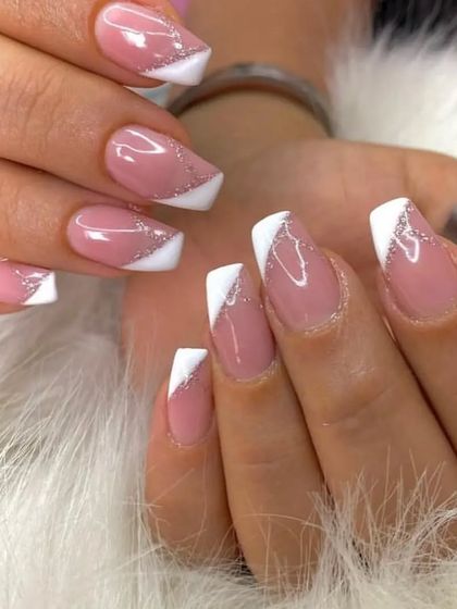 Another angle of the angular white French tip with a silver glitter line, showing the clean lines and sparkle.