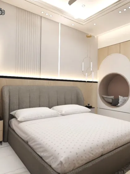 A cozy and modern bedroom design featuring a unique circular reading nook built into the wall. This clever use of space adds a whimsical and functional element to the room.