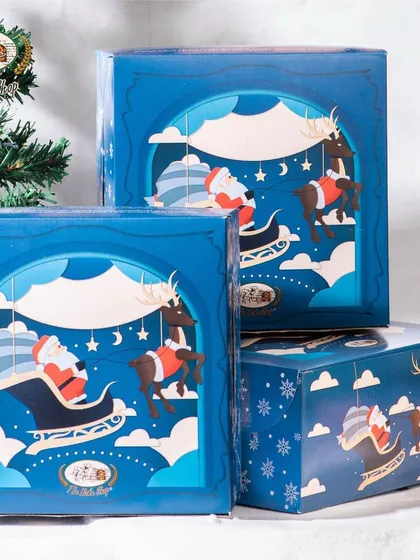 Our beautiful blue Christmas-themed packaging, perfect for creating a memorable gifting experience. These boxes are designed to be as delightful as the treats inside.